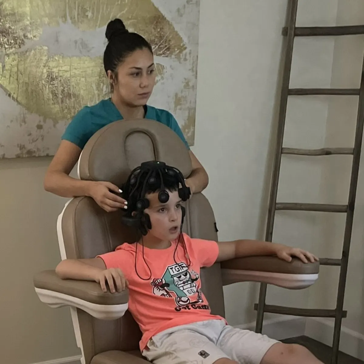 Child during a neurofeedback session at Neuron Connect, demonstrating the welcoming clinic environment